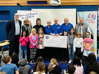 The Optimist Club of Red Deer donates $13,000 to Reading College.