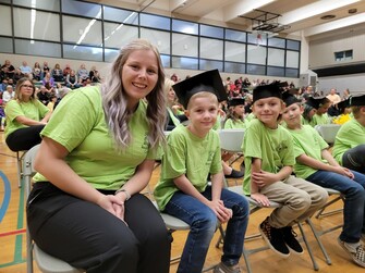 young students at graduation